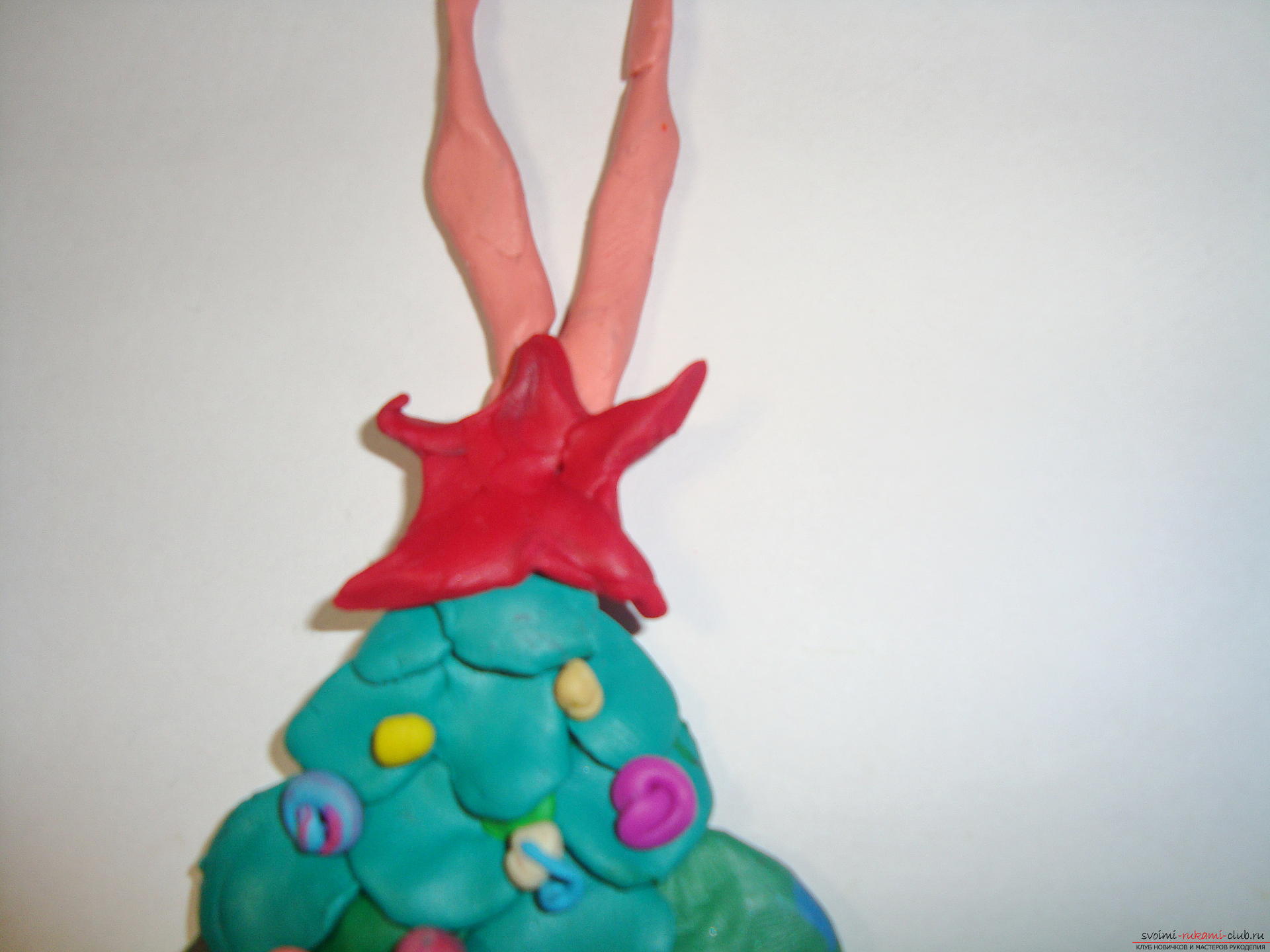 Every child dreams of magic on the eve of the New Year, so he will be interested in the New Year's craft in the form of a Christmas tree made of plasticine .. Photo №6