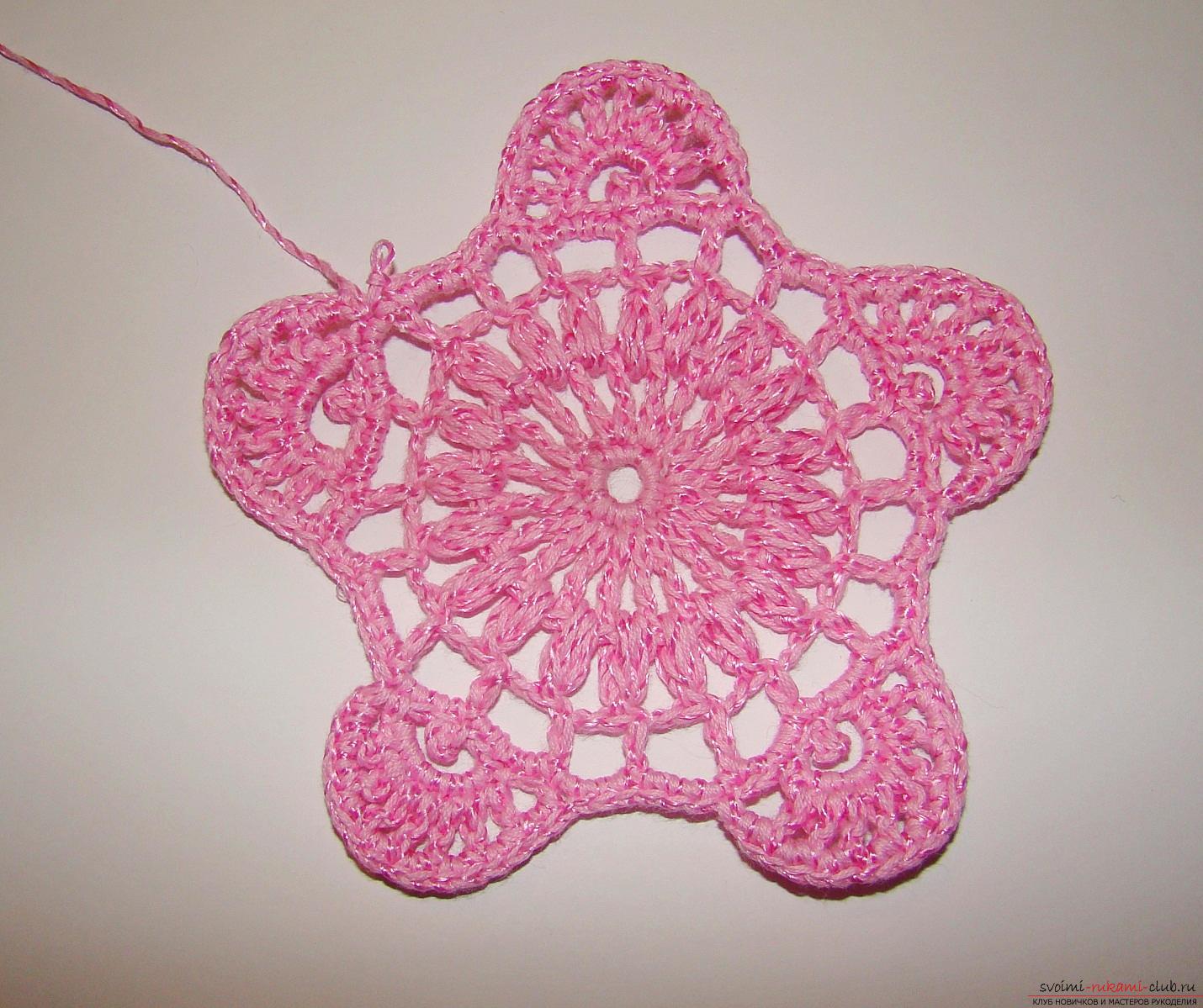 A master class of knitting with a diagram and a photo will teach you how to crochet an openwork flower with a crochet. Photo number 12