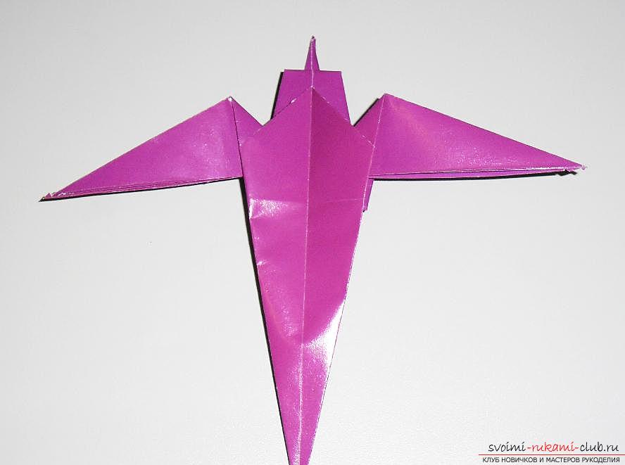 Crafting a swallow from paper in origami technique. Photo №29