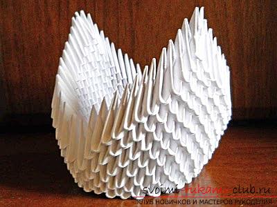 Modular origami swan in a snow-white range. Photo №4