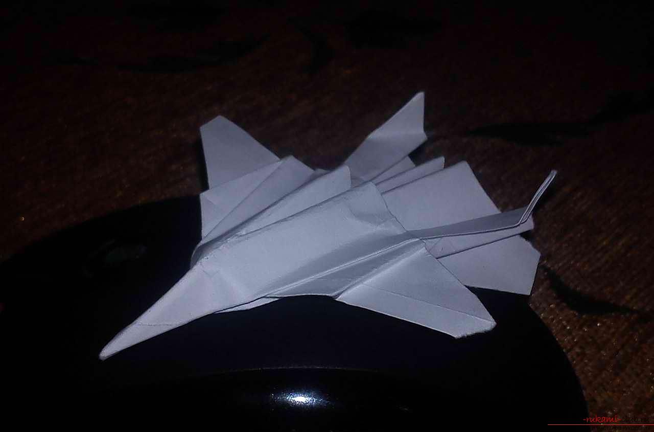 Methods of making paper airplanes in origami technique. Photo №8