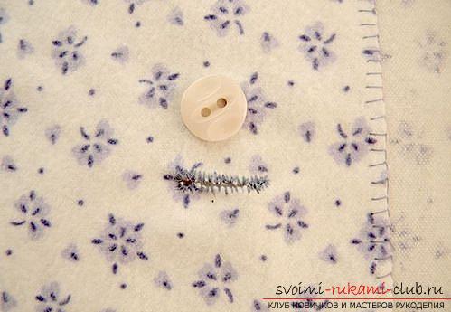 Een masterclass over het naaien van een baby's kraag voor een pasgeborene. Fotonummer 11