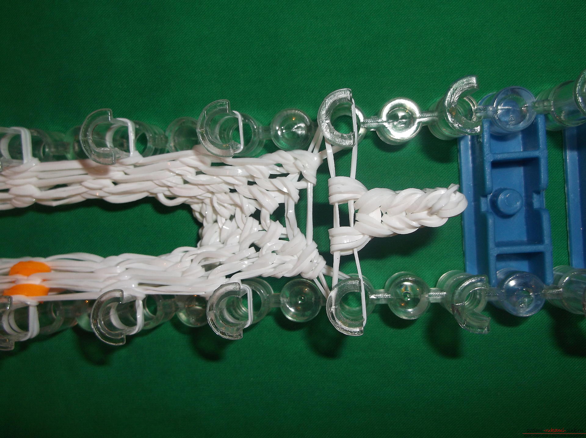 A photo for a lesson on weaving of snowman's rubber bands for the New Year holidays. Photo №7