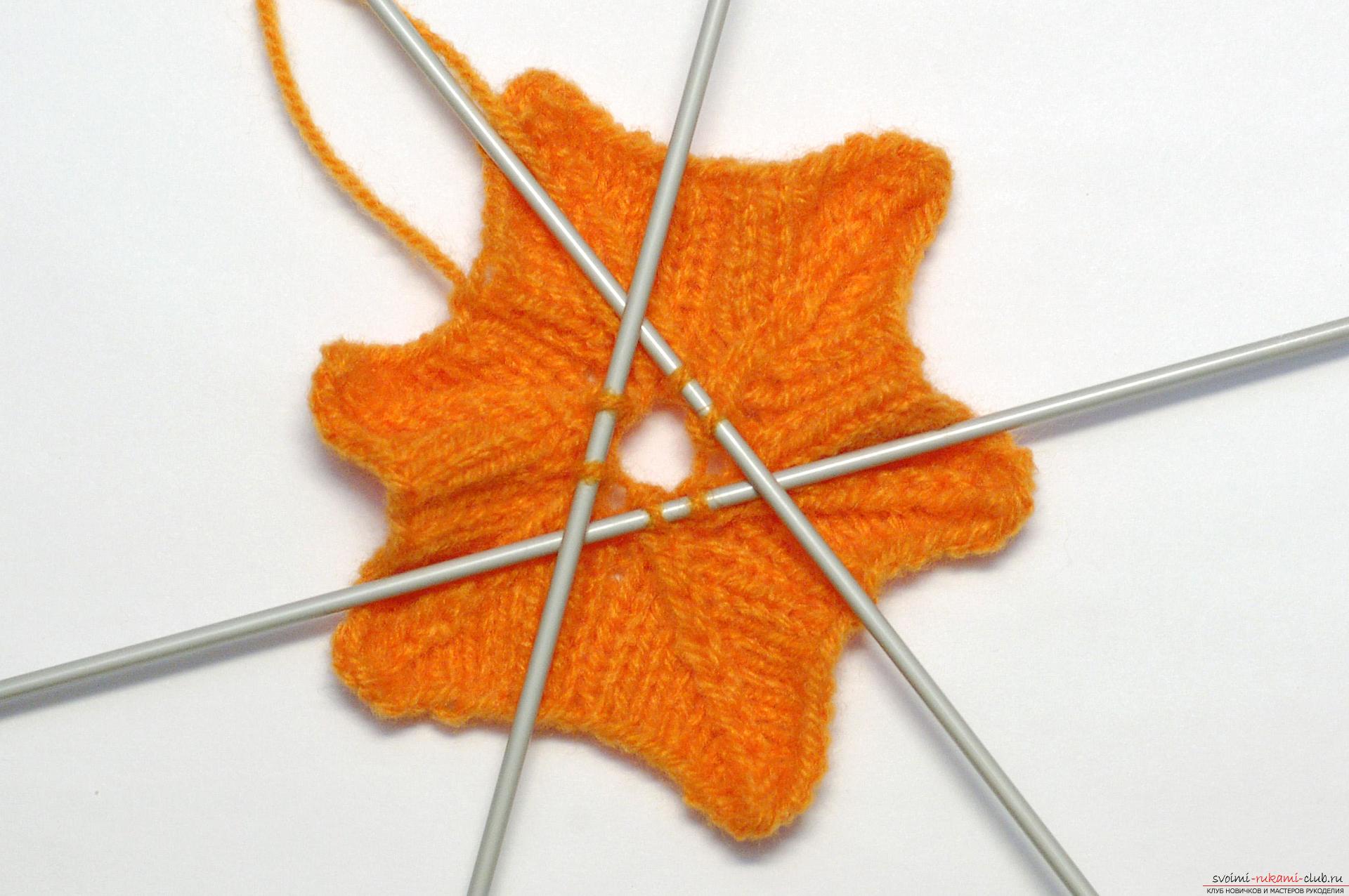 A master class of New Year's ornaments will teach you how to knit a knitted star on a Christmas tree with knitting needles. Photo Number 14