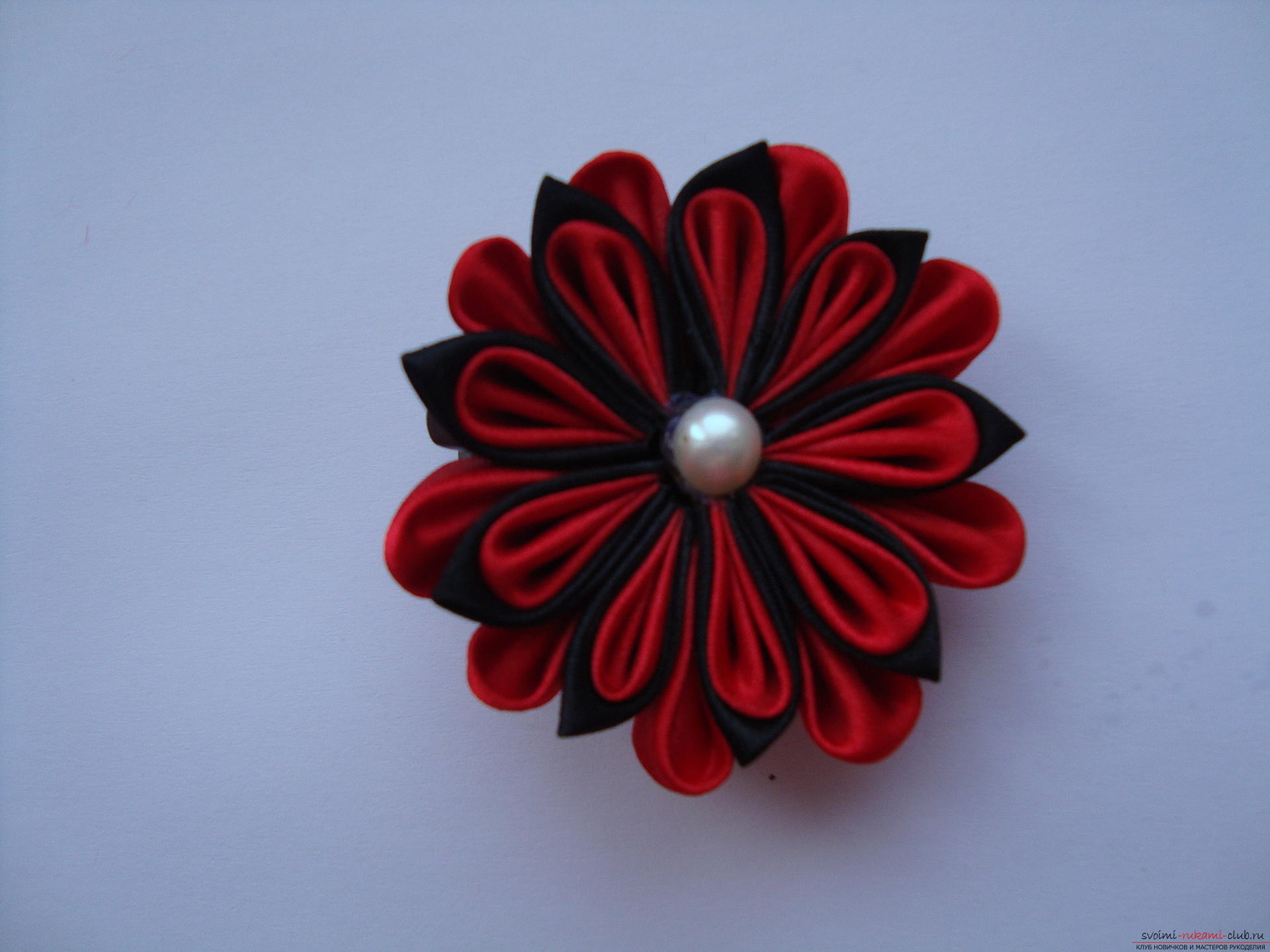 Step-by-step instruction on how to make a satin flower. Photo number 17