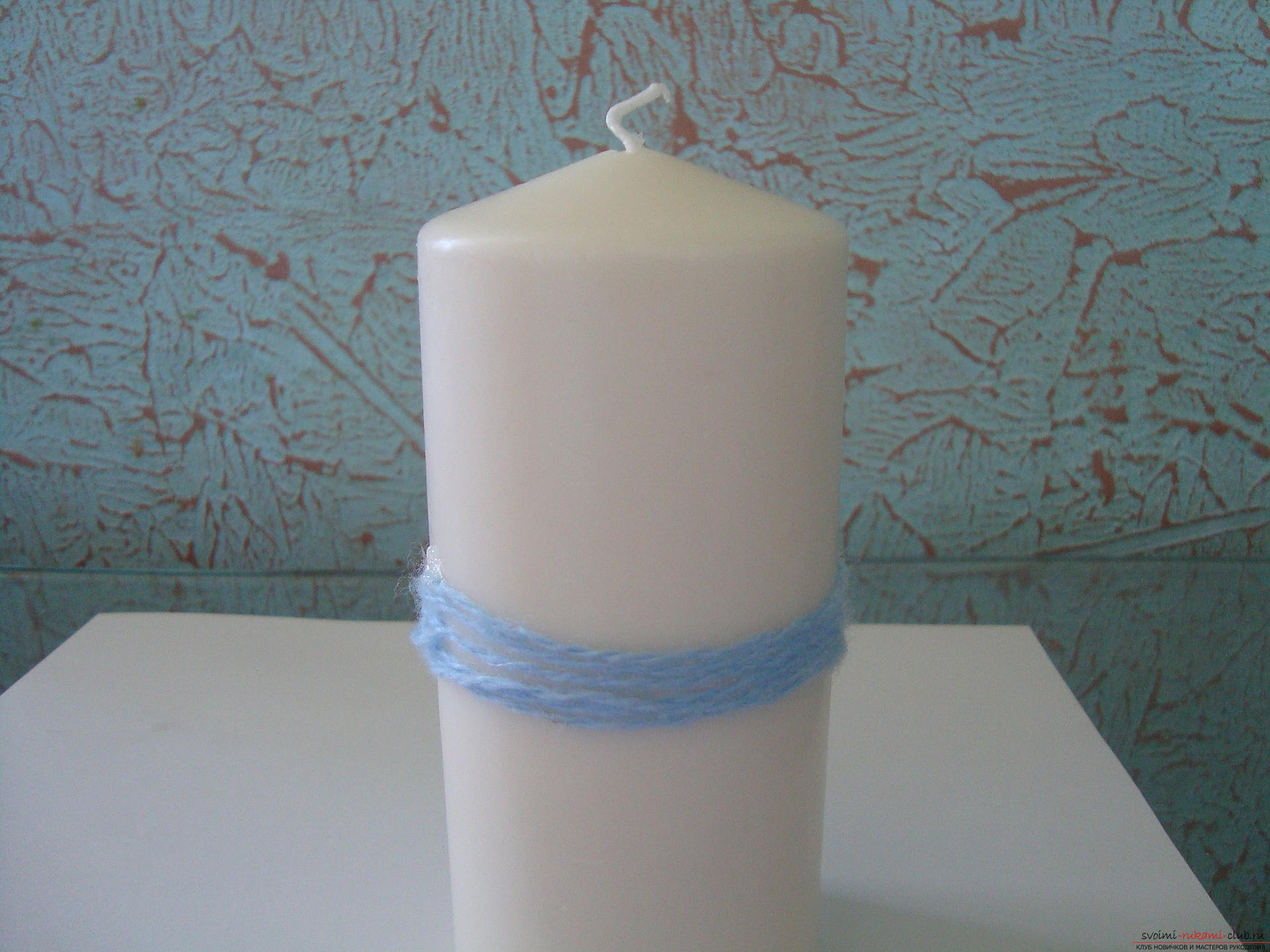 Step-by-step photos on the creation of a decorative candle. Picture №3