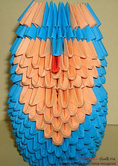 Figurine of an owl, assembled from modules in origami technique. Photo Number 9