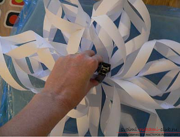 Volumetric snowflakes origami. Photo №7