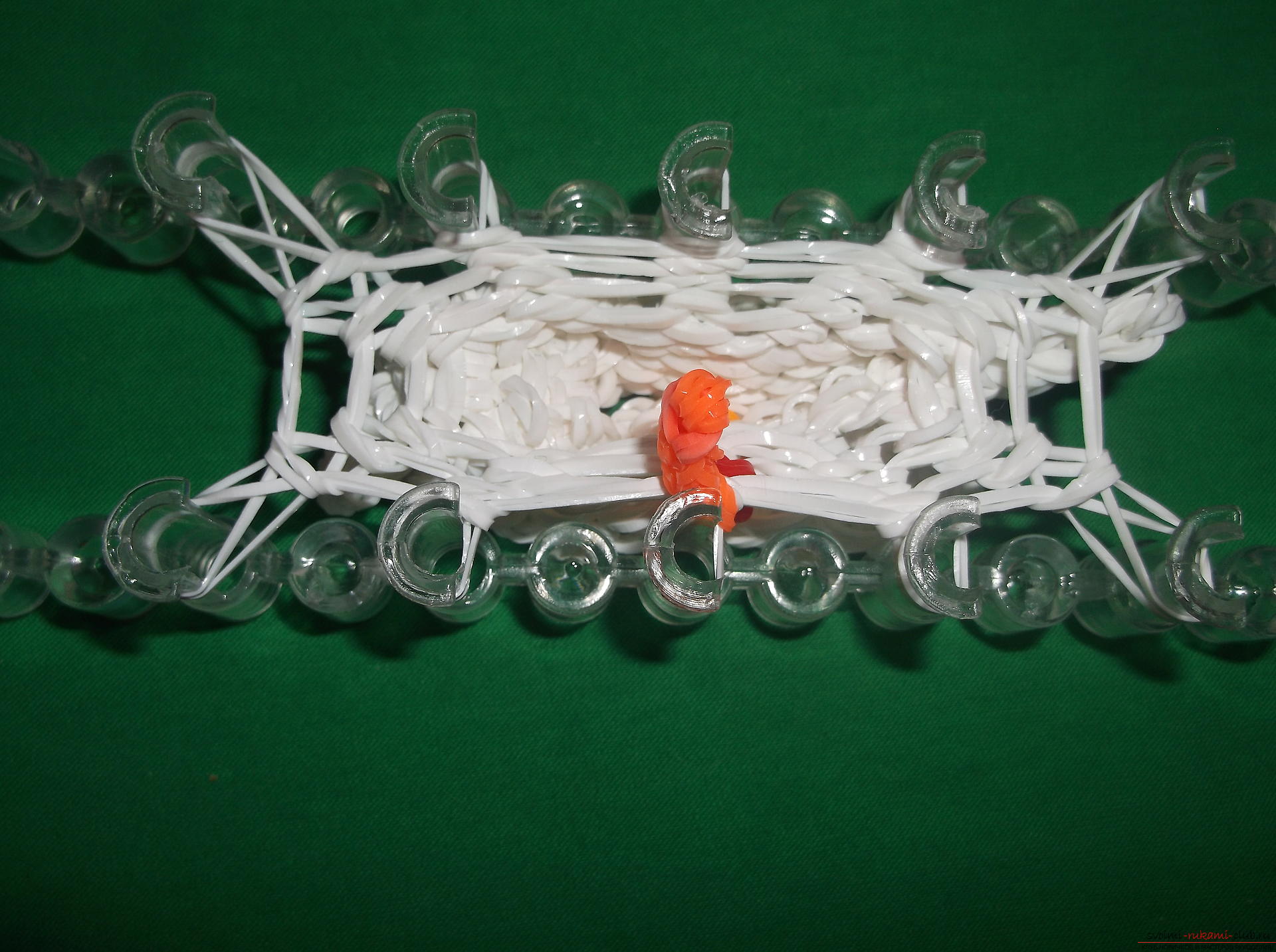 A photo for a lesson on weaving of snowman's rubber bands for the New Year holidays. Picture №10