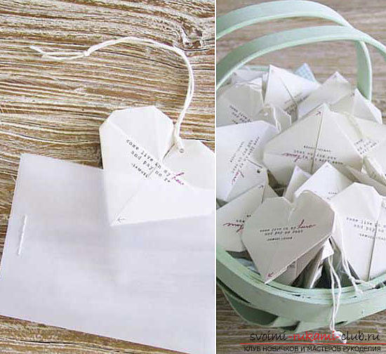 Een eenvoudige figuur is een hart van papier, een origami-techniek. Foto №1