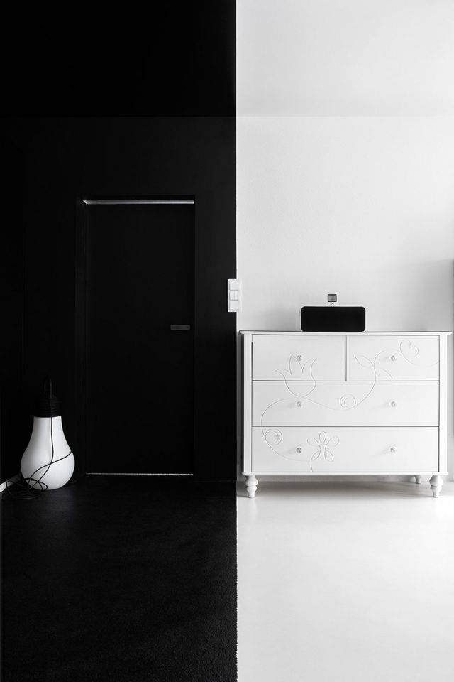 dressing room in black and white bedroom interior
