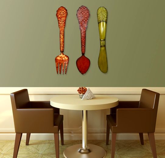 Large decorative cutlery on the wall