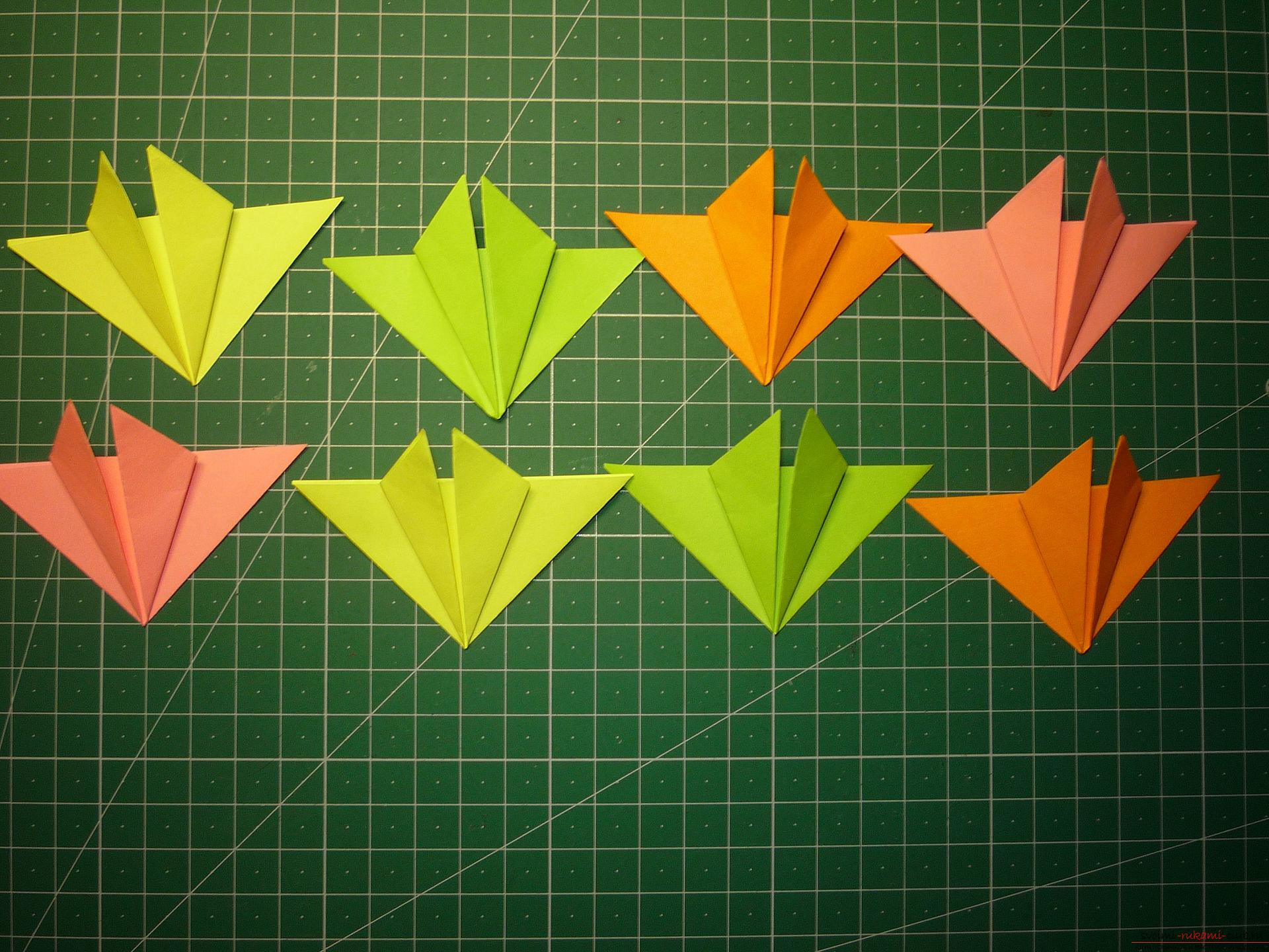 The master class will tell you how to make a modular origami star out of paper with your own hands. Photo №7