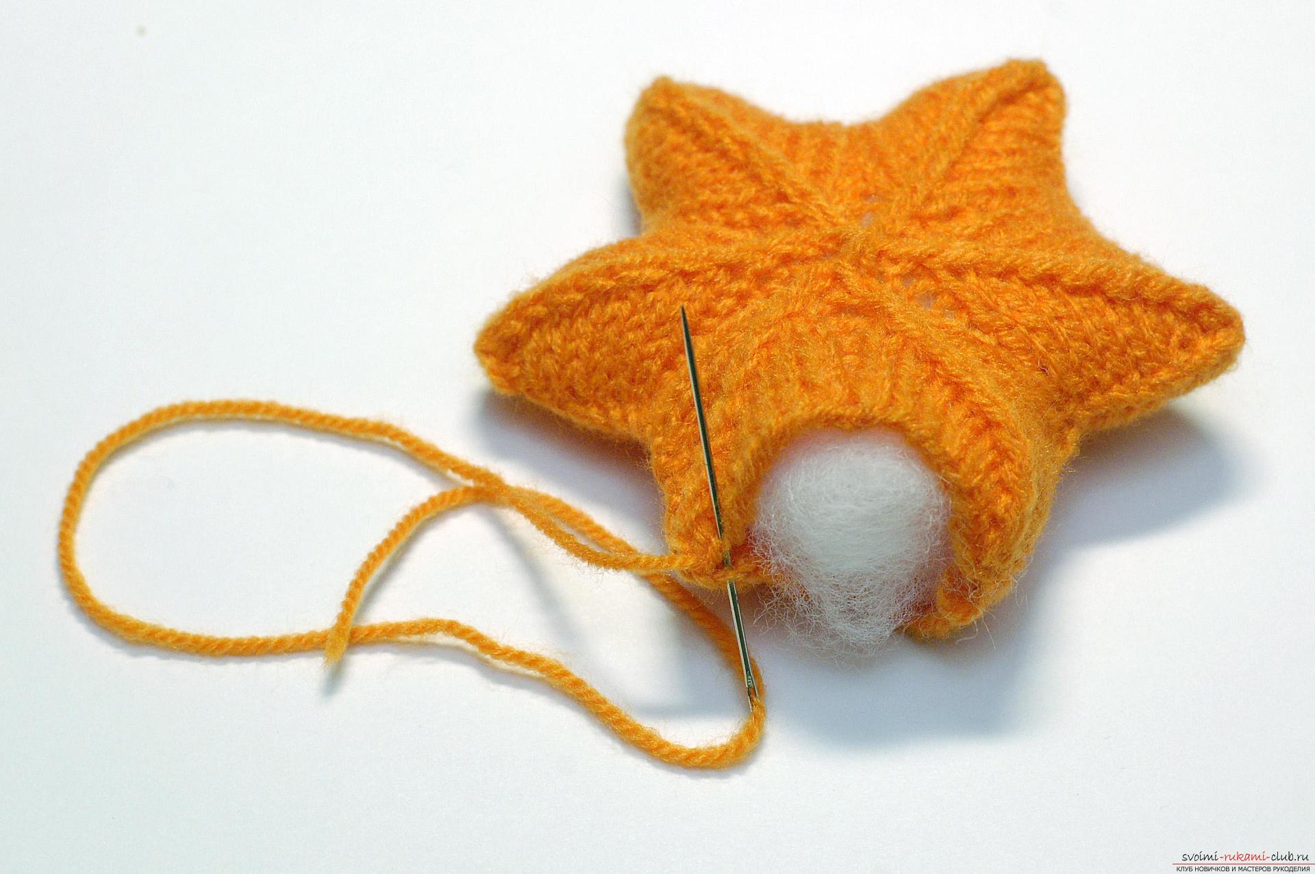 A master class of New Year's ornaments will teach you how to knit a knitted star on a Christmas tree with knitting needles. Photo number 16