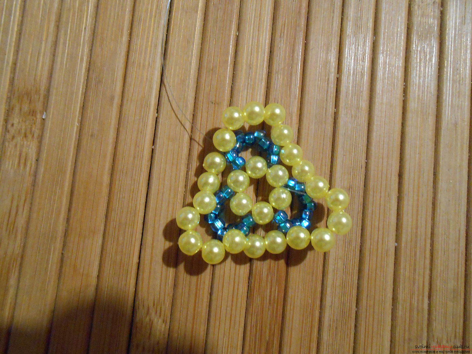 This master class of weaving from beads will tell you how to weave the earrings yourself .. Photo №13