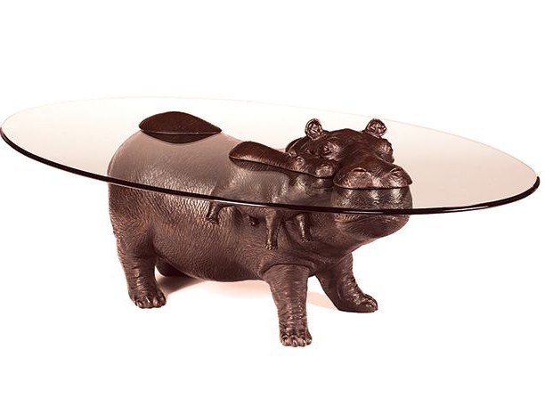 table in the form of an animal - a hippopotamus with a toddler