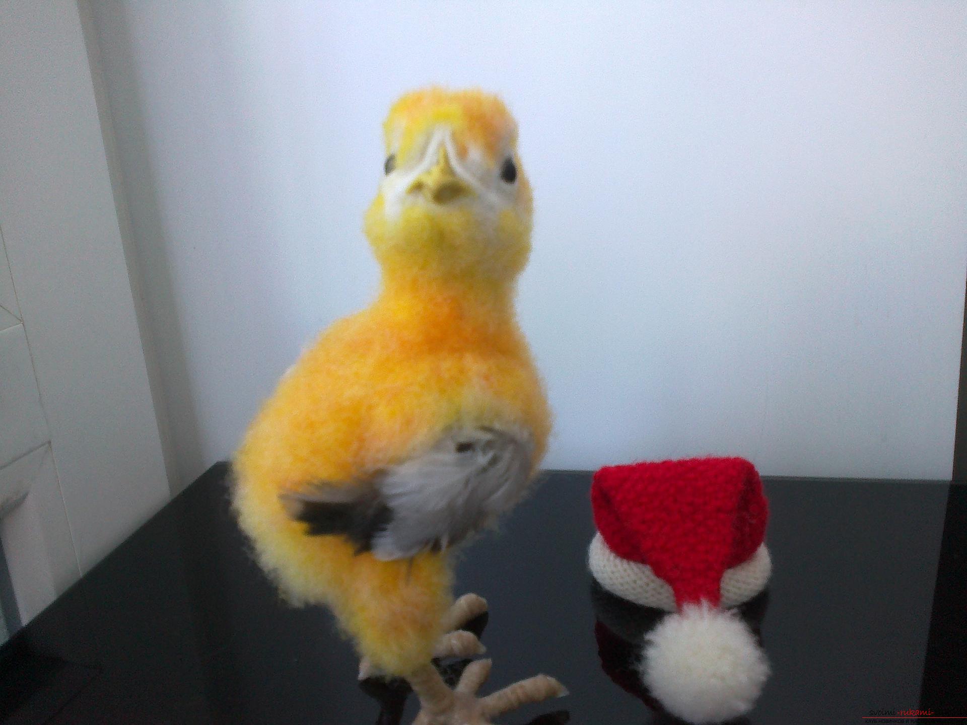 Description of the toy in the form of a chicken, made in the technique of dry felting. Photo №7