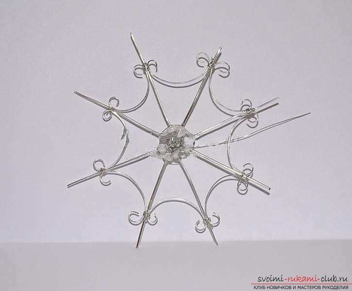 We make a snowflake from the wire. Photo Number 9