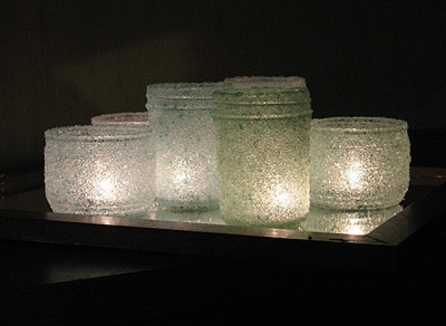 Glass jar candlesticks decorated with sea salt