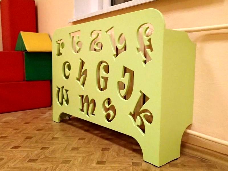 wooden screen for radiators in the children's room