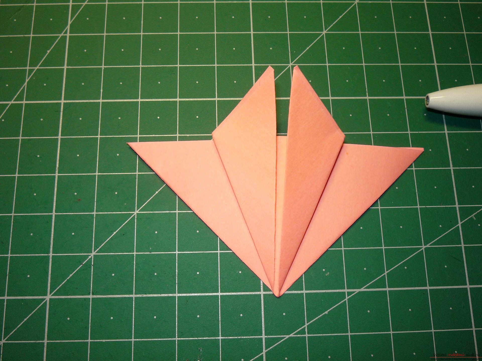 The master class will tell you how to make a modular origami star out of paper with your own hands. Photo №6