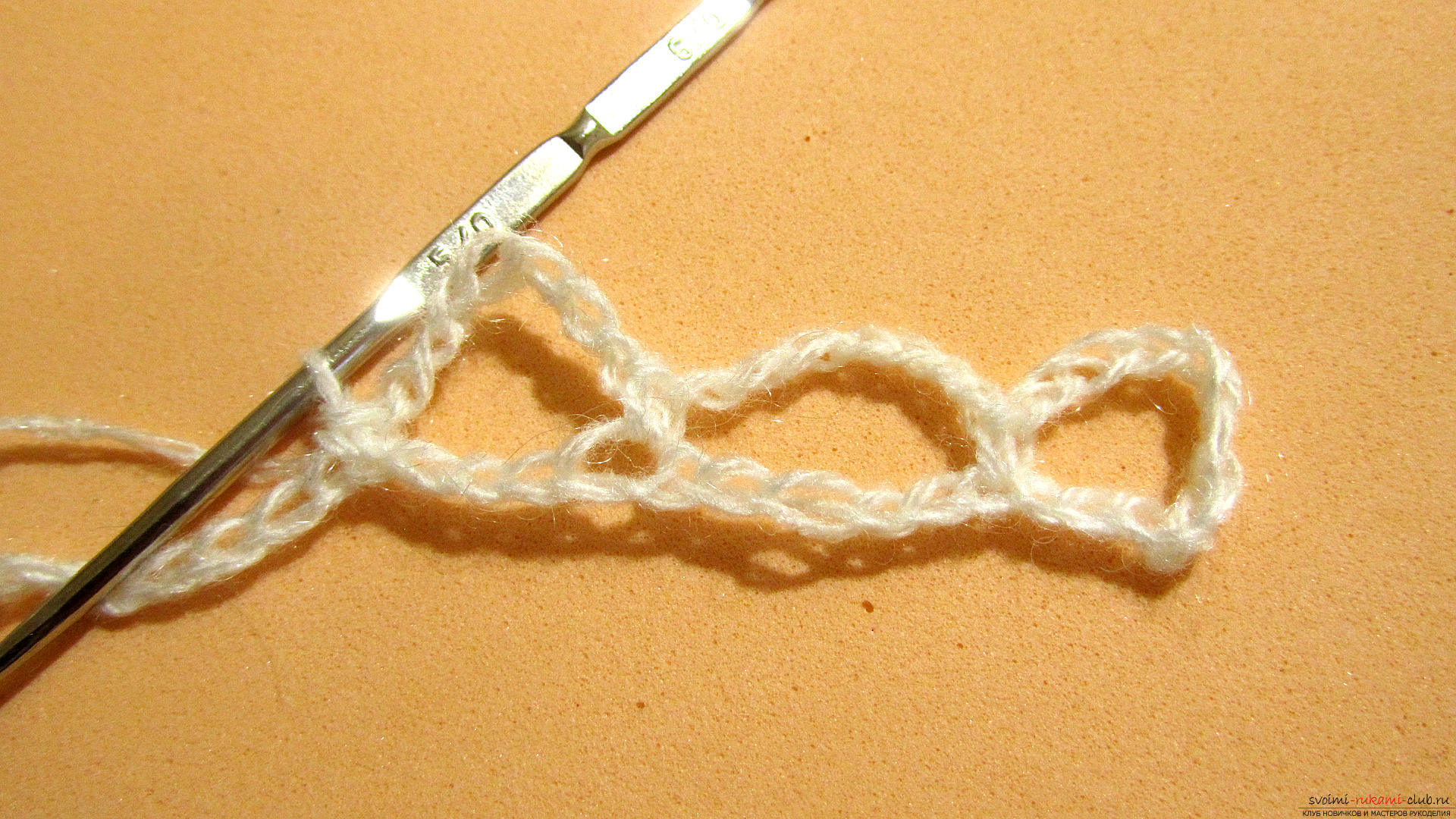 The master class is dedicated to knitting a beautiful stitch with a crochet. Photo №5