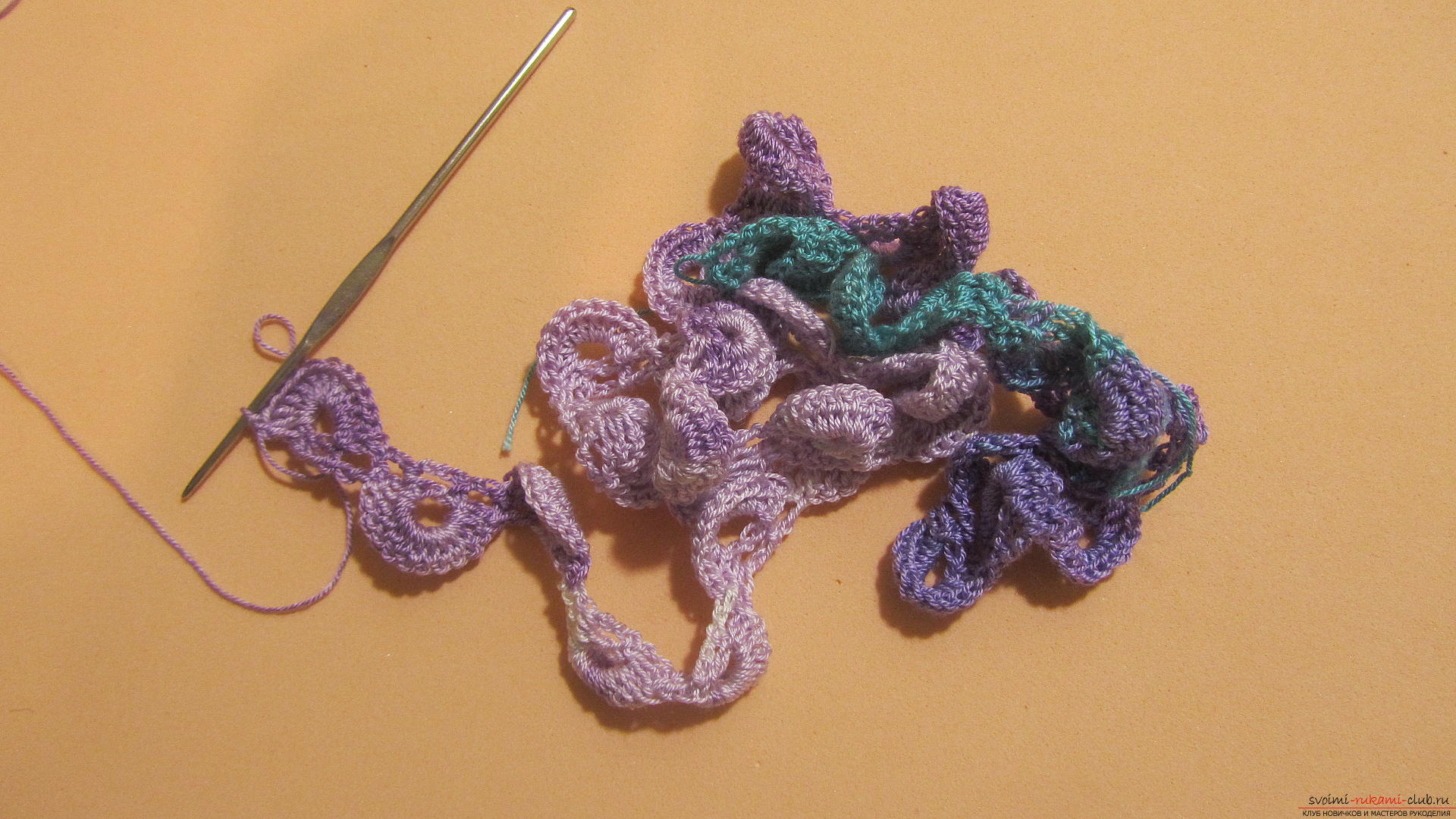 The master class will tell you in detail about crochet work on an openwork scarf. Photo Number 22