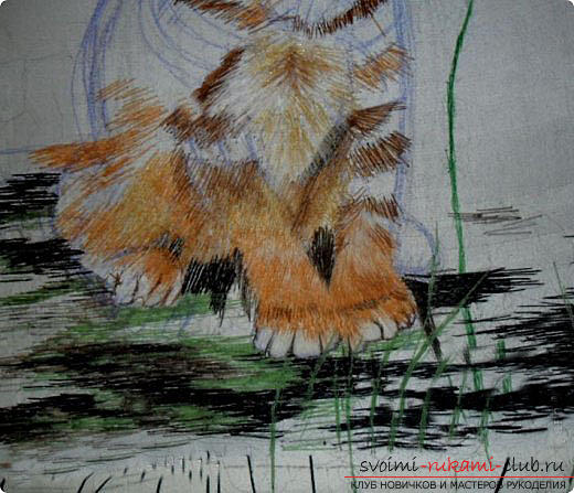 We embroider with a smooth beautiful red cat. Photo number 12