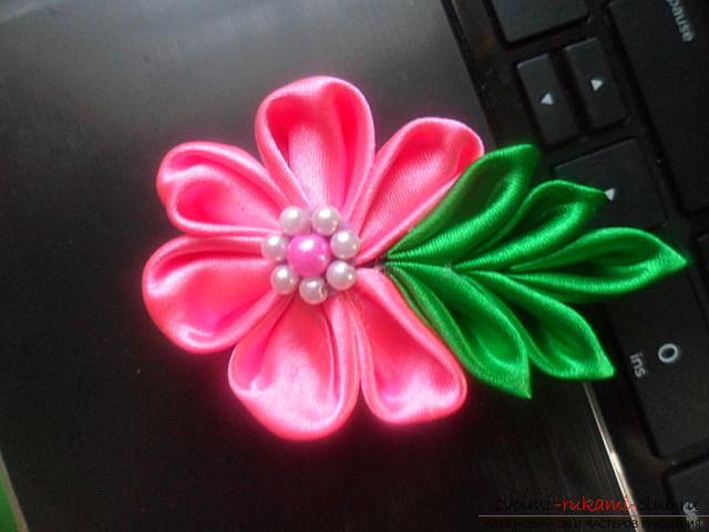 An amazing flower for decorating hairpins can be done quickly and easily with our own hands from satin ribbons. Photo №1