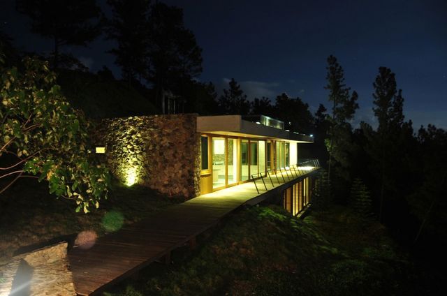 night exterior of the house on the slope of the architectural studio Vasho