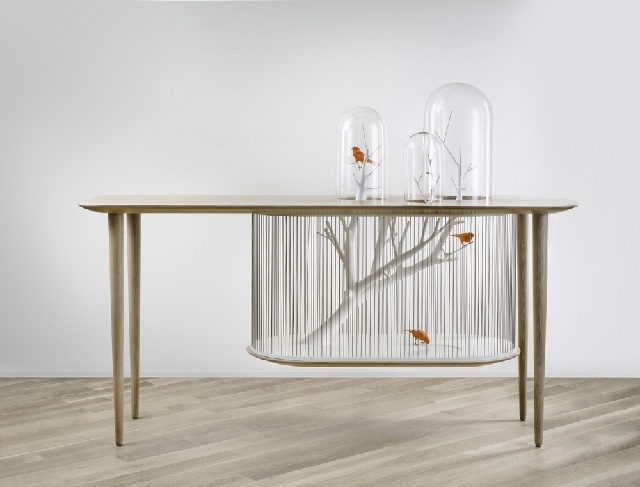 Decorative cage for birds, built into the table