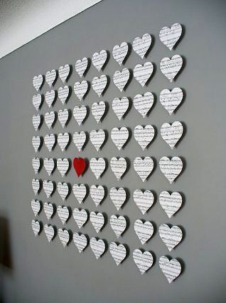 Paper hearts with 3D effect on the wall