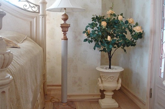 Artificial flowers in the bedroom interior