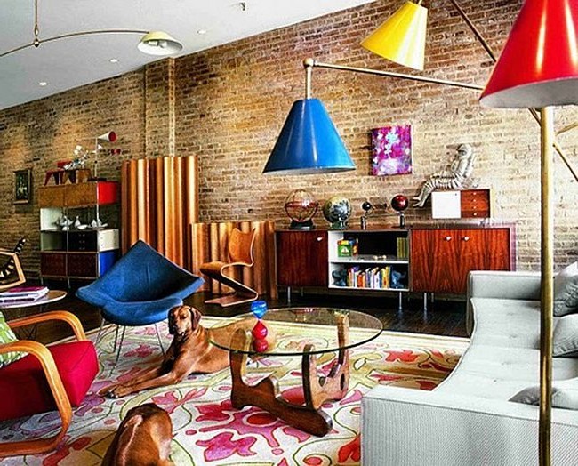 Loft style living room with brick wall and bright lights.