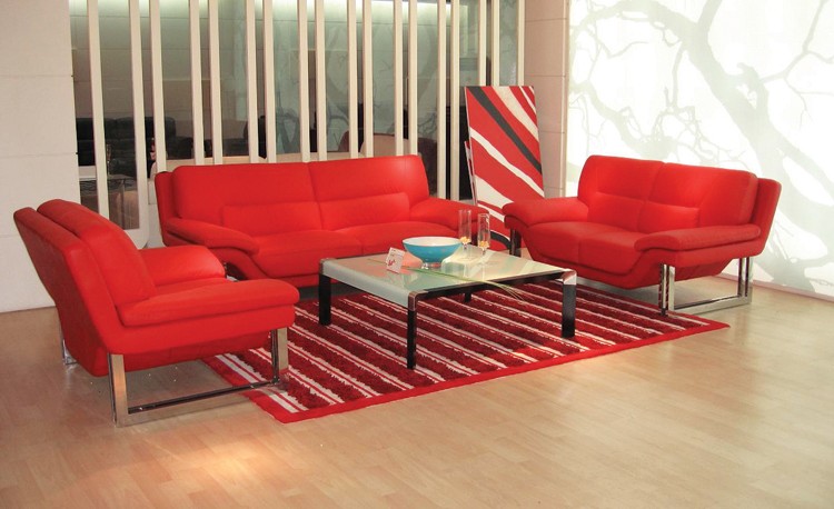 Red sofas in a bright interior