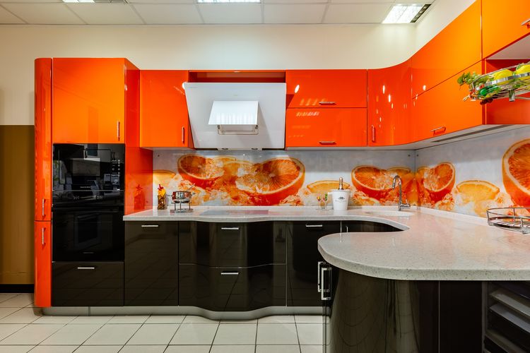 Bright two-tone kitchen with corner worktop