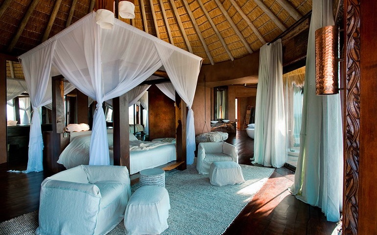 Chic bedroom in Leobo Private Reserve villa