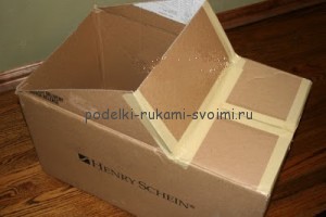 zvětšení zipu s rukama z krabice (1)
