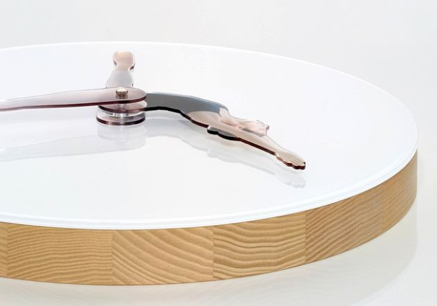 a clock with a ballerina from meike harde time is dancing