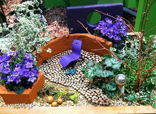 Miniature garden with outdoor furniture