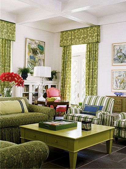 Green furniture: sofas, armchairs and a coffee table