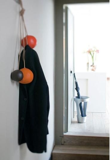 Wall hanger in the form of balls