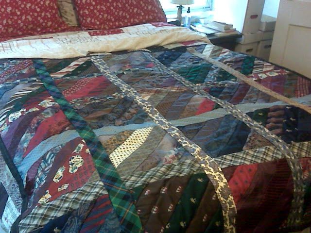 bedspread on a patchwork bed of tie