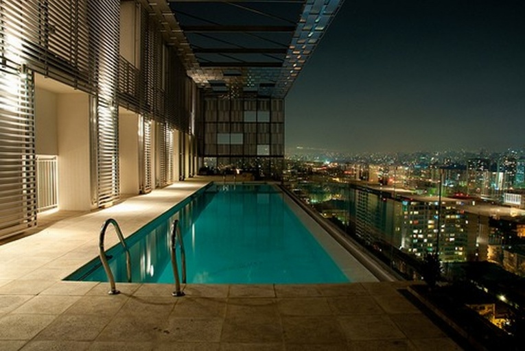 Despite the high cost of maintenance, pool balconies appear even in urban apartments
