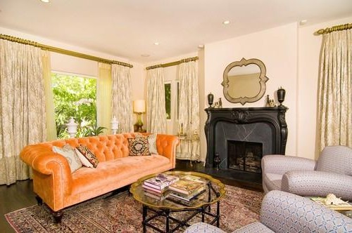 Orange sofa in the living room decor