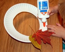 Autumn decoration. Wreath from autumn leaves by own hands