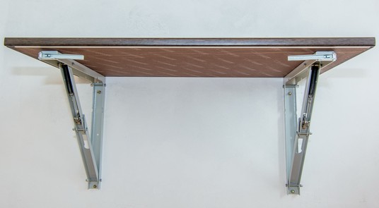 Folding table on bracket