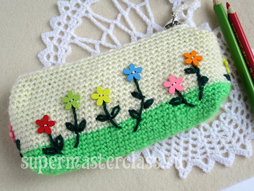 Crocheted pencil case with flowers