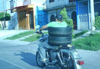 Carriage of wheels on a motorcycle.