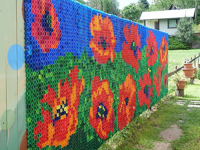 Chic mosaic on the fence of bottle caps